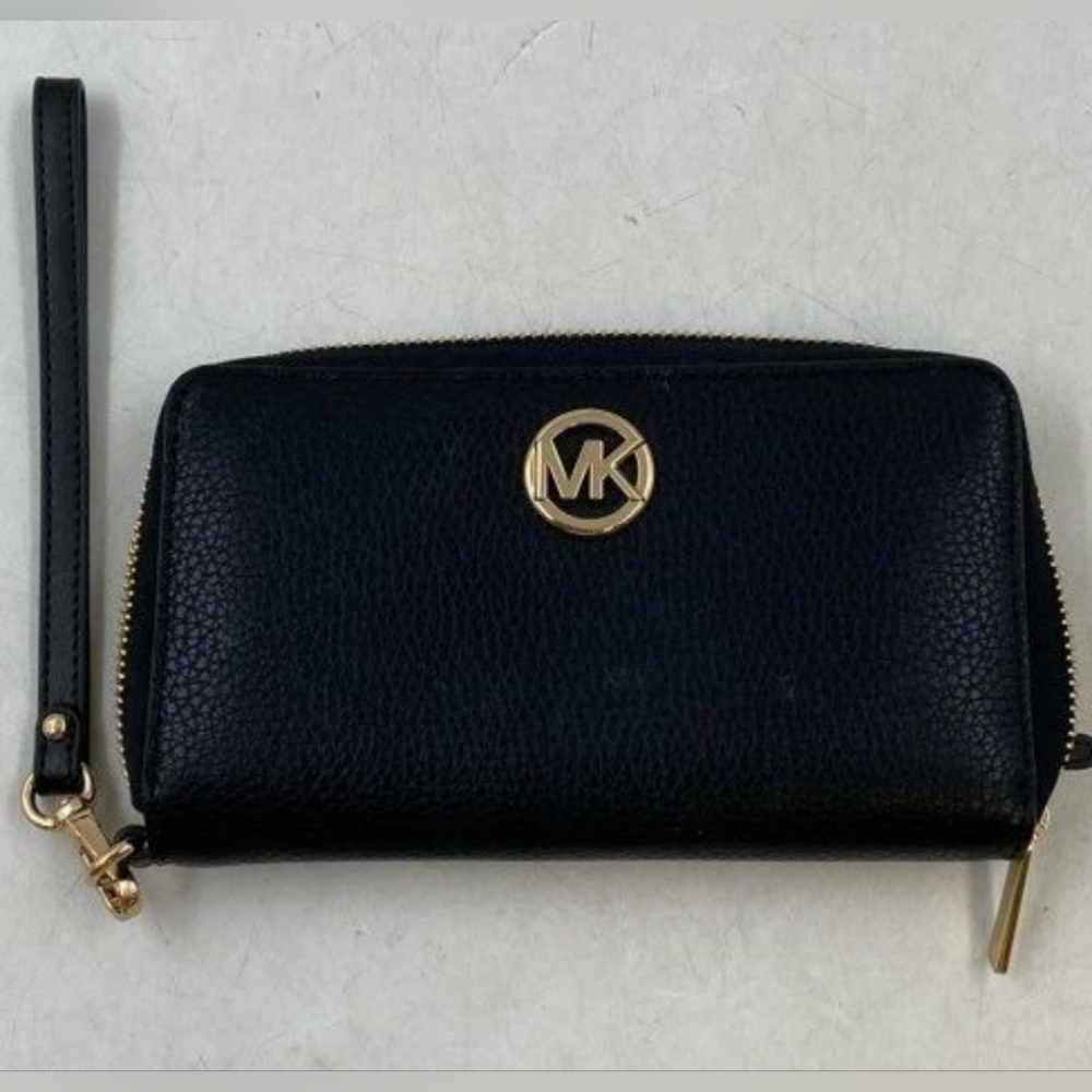 Michael Kors Black and Gold Wristlet/wallet with Zip-Around Design.